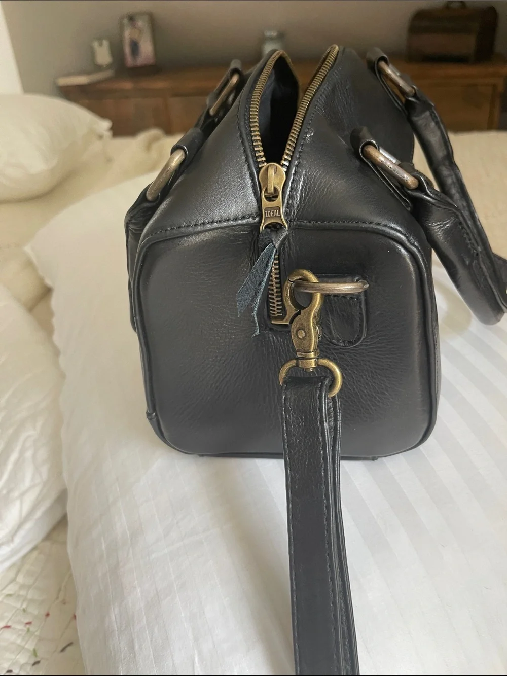 Black Leather Satchel with Top Handles and Crossbody Strap